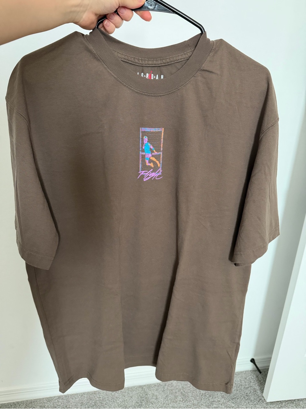 Jordan Brown Short Sleeve Tee with Small Flight Graphic